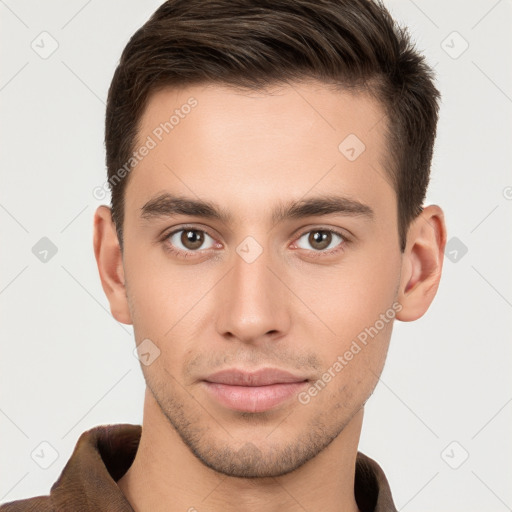 Neutral white young-adult male with short  brown hair and brown eyes