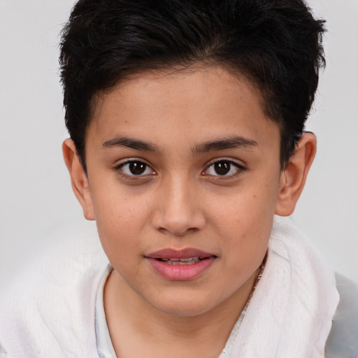 Joyful white child female with short  brown hair and brown eyes