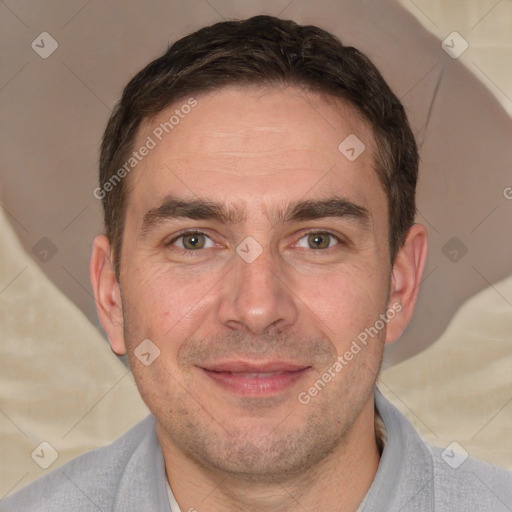 Joyful white adult male with short  brown hair and brown eyes