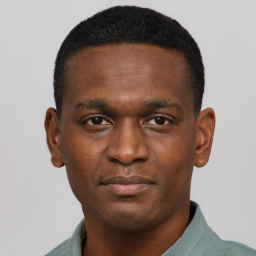 Neutral black young-adult male with short  brown hair and brown eyes