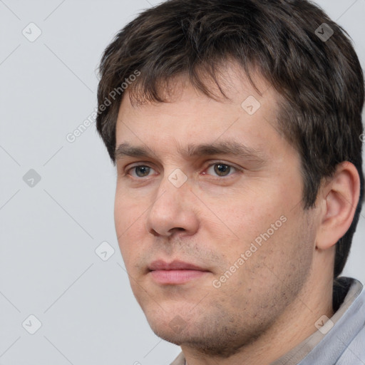 Neutral white adult male with short  brown hair and brown eyes