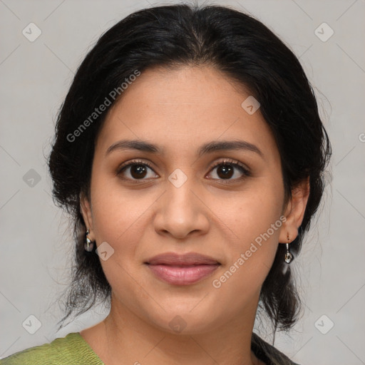 Joyful latino young-adult female with medium  brown hair and brown eyes