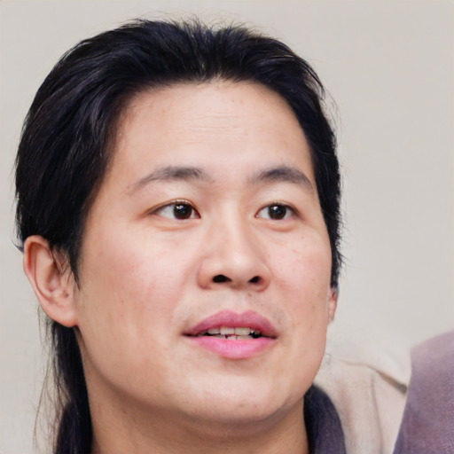 Neutral asian young-adult male with medium  brown hair and brown eyes