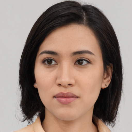 Neutral asian young-adult female with medium  black hair and brown eyes