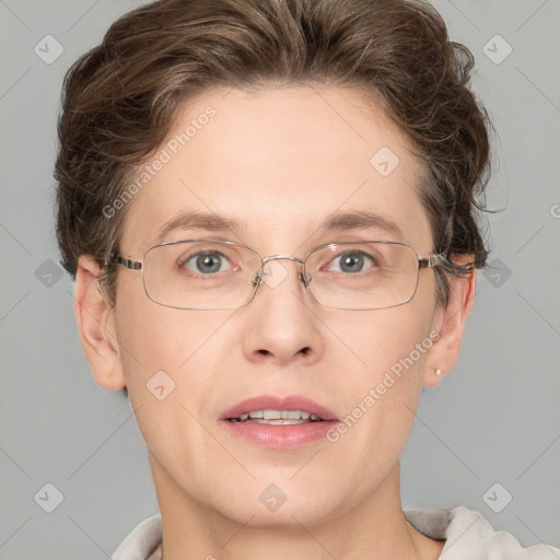 Joyful white adult female with short  brown hair and grey eyes