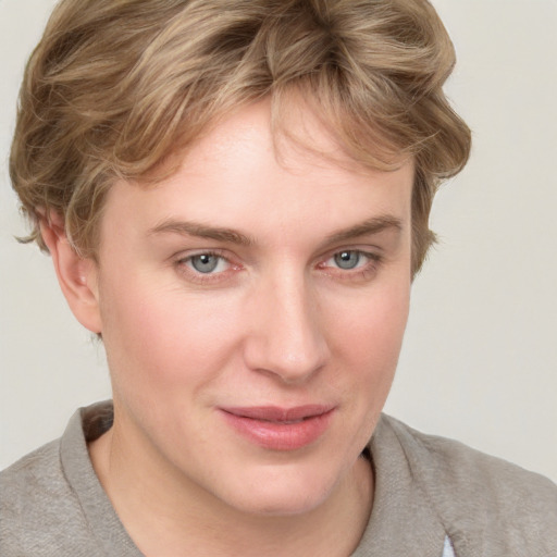 Joyful white young-adult female with medium  brown hair and blue eyes