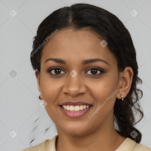 Joyful black young-adult female with medium  black hair and brown eyes