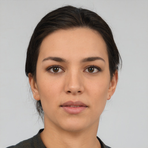 Neutral white young-adult female with short  brown hair and brown eyes
