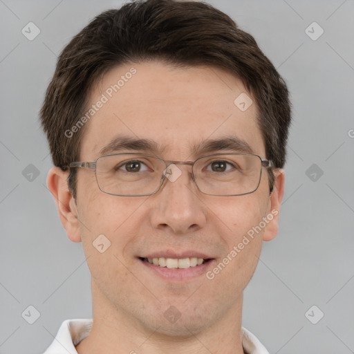 Joyful white adult male with short  brown hair and brown eyes