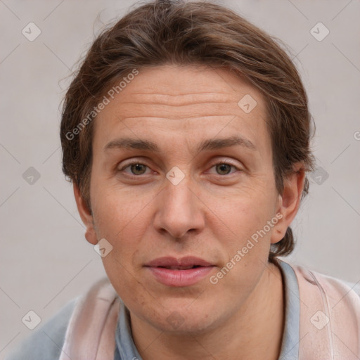 Joyful white adult female with short  brown hair and brown eyes