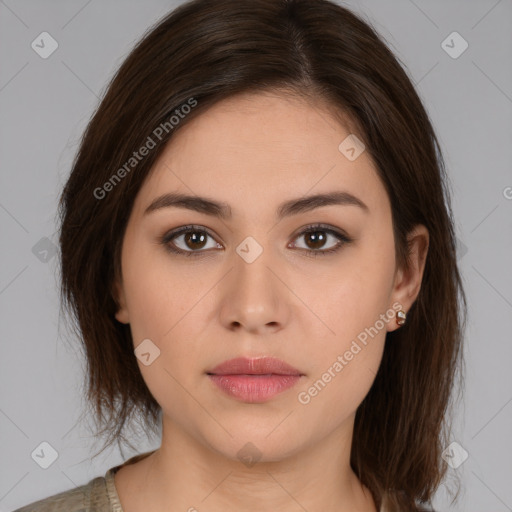 Neutral white young-adult female with medium  brown hair and brown eyes