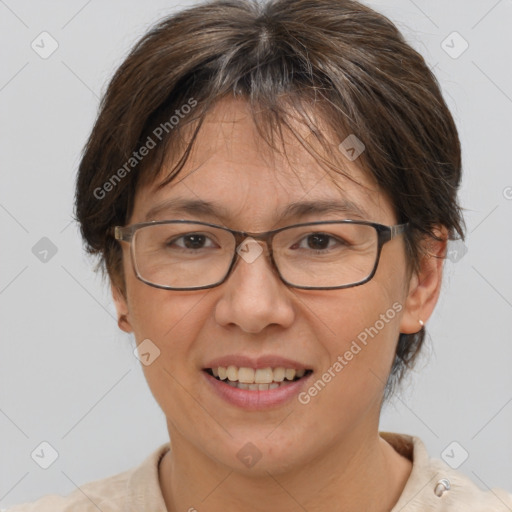 Joyful white adult female with short  brown hair and brown eyes