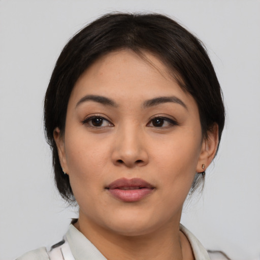Neutral asian young-adult female with medium  brown hair and brown eyes