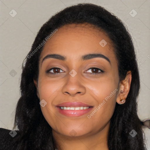 Joyful latino young-adult female with long  black hair and brown eyes