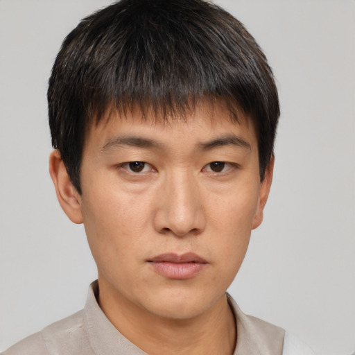 Neutral asian young-adult male with short  brown hair and brown eyes