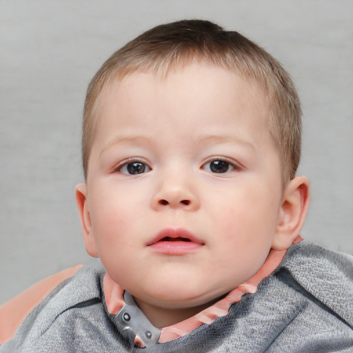 Neutral white child male with short  brown hair and blue eyes