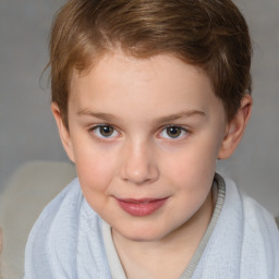 Joyful white child female with short  brown hair and brown eyes