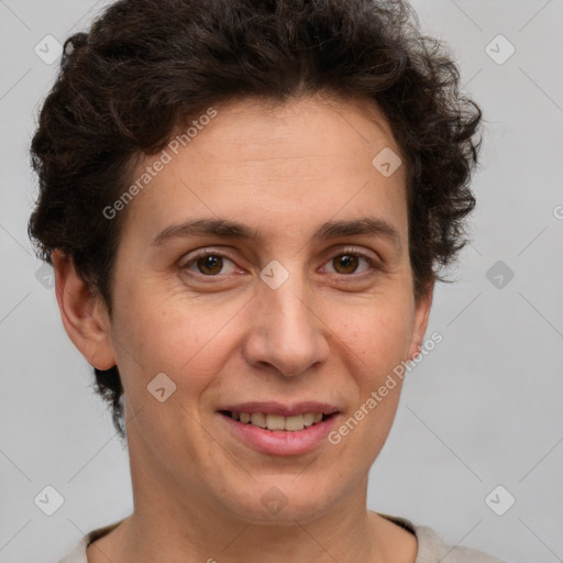 Joyful white adult female with short  brown hair and brown eyes