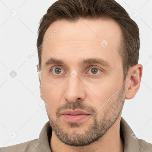 Neutral white adult male with short  brown hair and brown eyes