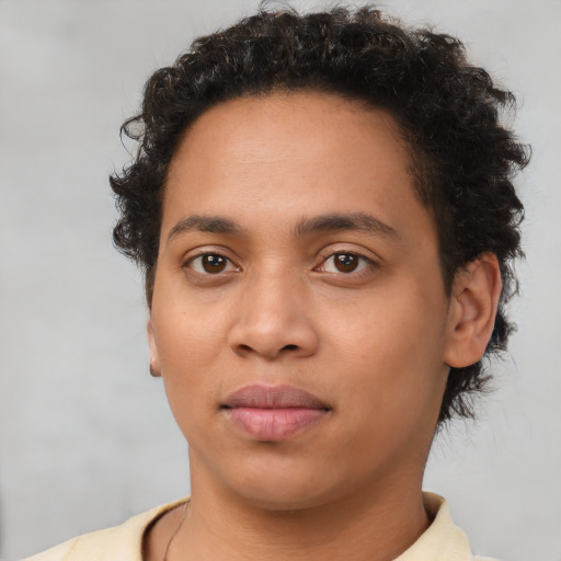 Neutral black young-adult female with short  brown hair and brown eyes
