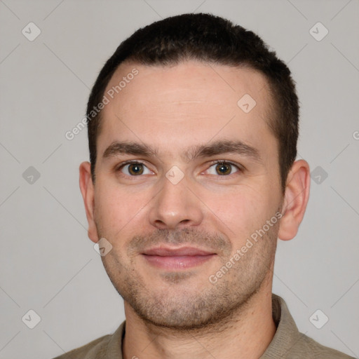 Joyful white young-adult male with short  brown hair and brown eyes