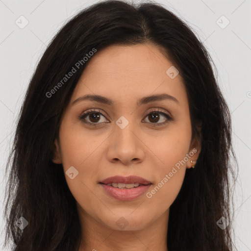 Joyful latino young-adult female with long  brown hair and brown eyes