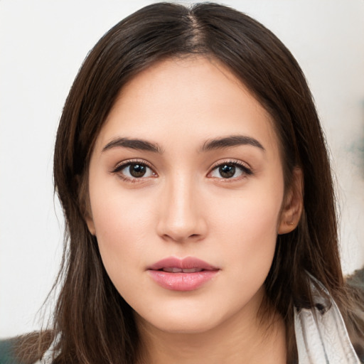 Neutral white young-adult female with long  brown hair and brown eyes