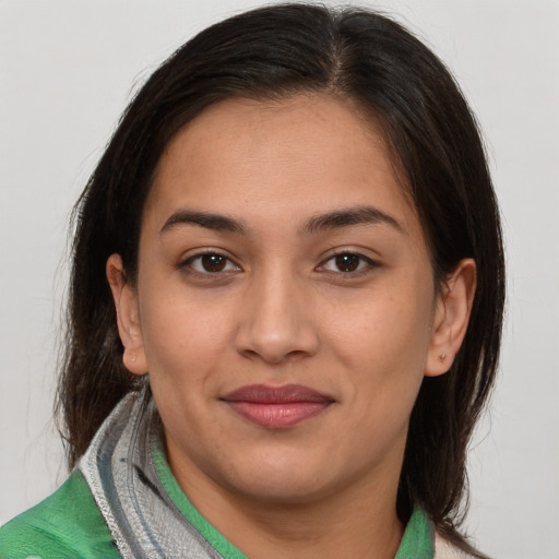 Joyful white young-adult female with medium  brown hair and brown eyes