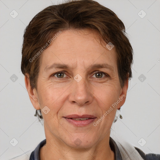 Joyful white adult female with short  brown hair and brown eyes