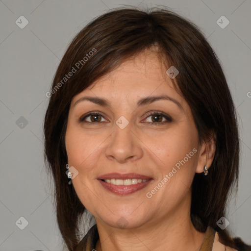 Joyful white adult female with medium  brown hair and brown eyes