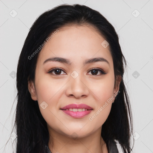 Joyful asian young-adult female with long  black hair and brown eyes