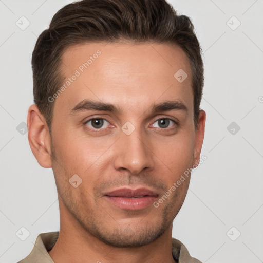 Joyful white young-adult male with short  brown hair and brown eyes