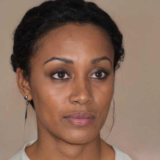 Neutral black young-adult female with short  brown hair and brown eyes
