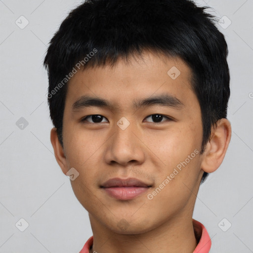 Joyful asian young-adult male with short  black hair and brown eyes