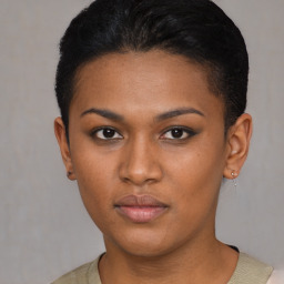 Neutral black young-adult female with short  brown hair and brown eyes