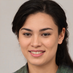 Joyful asian young-adult female with medium  brown hair and brown eyes