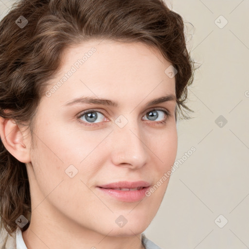 Joyful white young-adult female with medium  brown hair and green eyes