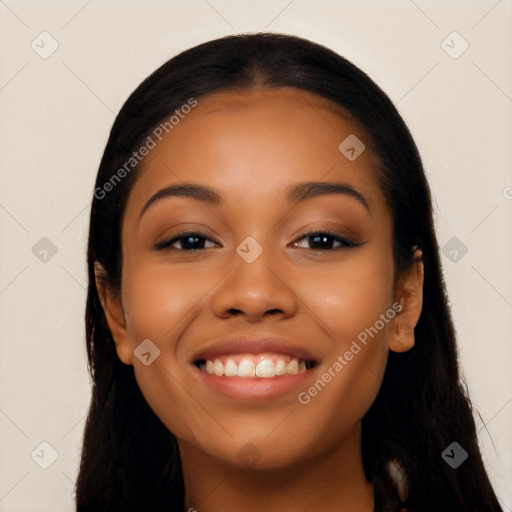 Joyful latino young-adult female with long  black hair and brown eyes