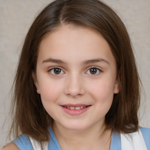 Joyful white child female with medium  brown hair and brown eyes