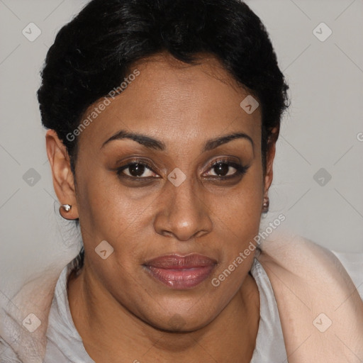 Joyful black young-adult female with short  brown hair and brown eyes
