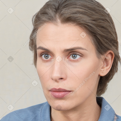 Neutral white young-adult female with medium  brown hair and grey eyes