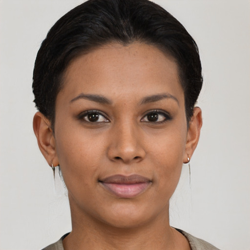 Joyful asian young-adult female with short  brown hair and brown eyes