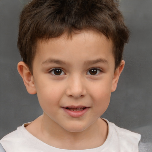 Joyful white child male with short  brown hair and brown eyes