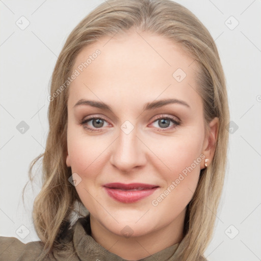 Joyful white young-adult female with long  brown hair and blue eyes