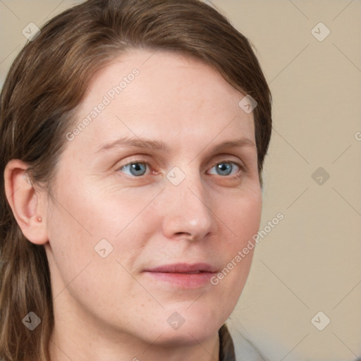 Neutral white young-adult female with long  brown hair and grey eyes