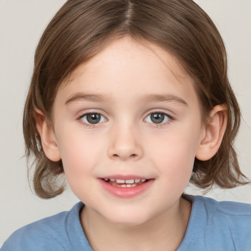 Joyful white child female with medium  brown hair and brown eyes