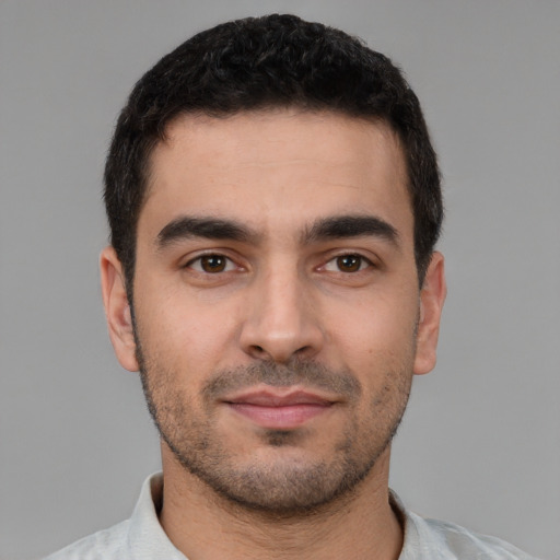 Neutral white young-adult male with short  black hair and brown eyes
