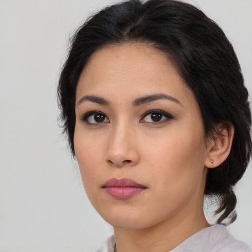 Neutral asian young-adult female with medium  black hair and brown eyes