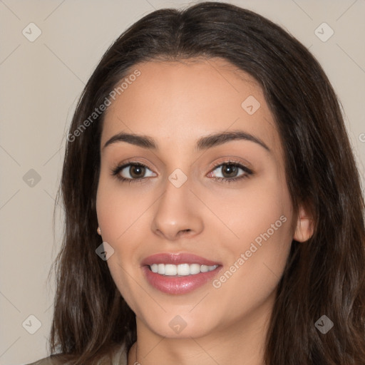 Joyful white young-adult female with long  brown hair and brown eyes