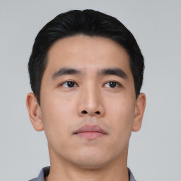 Neutral asian young-adult male with short  black hair and brown eyes